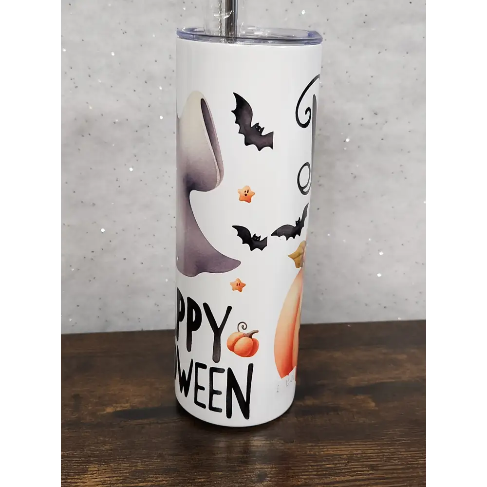 A Halloween Tumbler with a cute ghost and pumpkin design - Tumbler