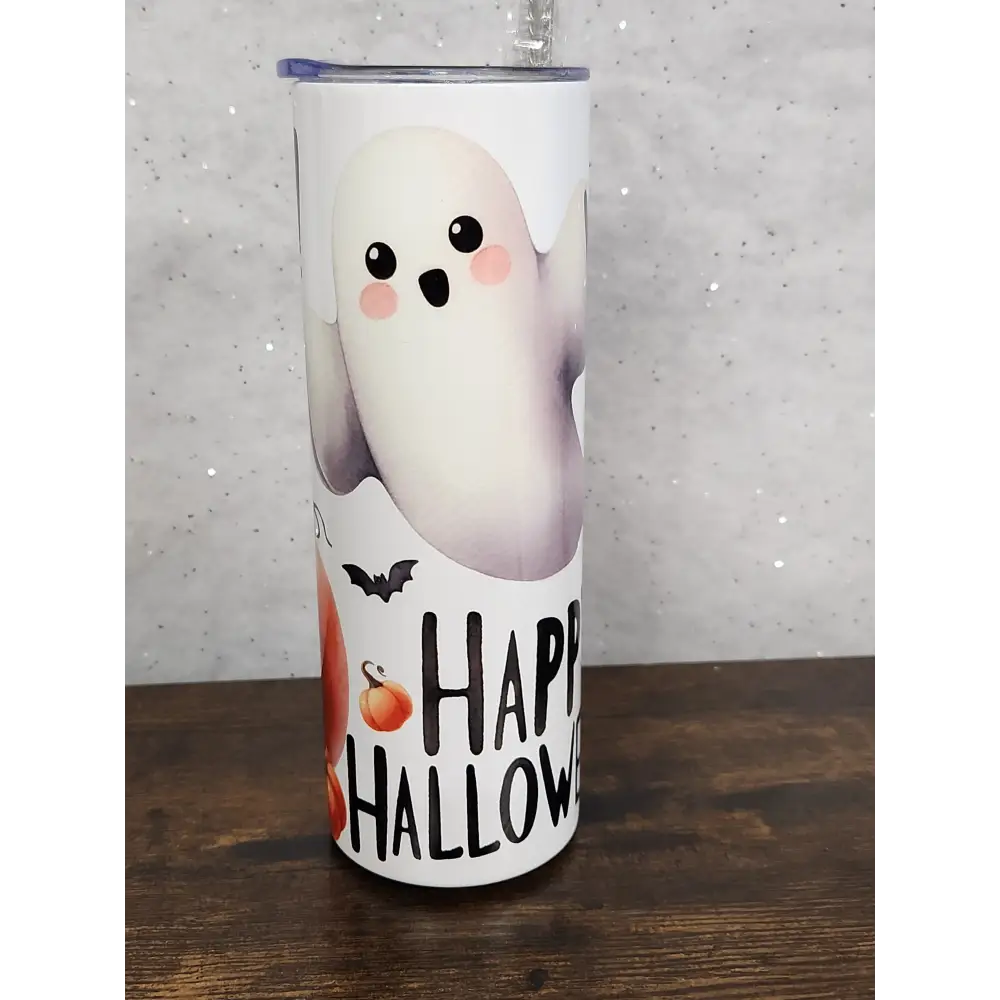 A Halloween Tumbler with a cute ghost and pumpkin design - Tumbler
