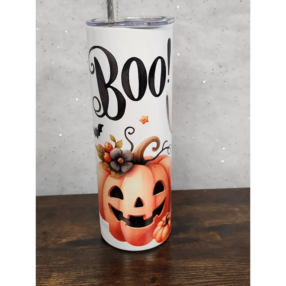 A Halloween Tumbler with a cute ghost and pumpkin design - Tumbler