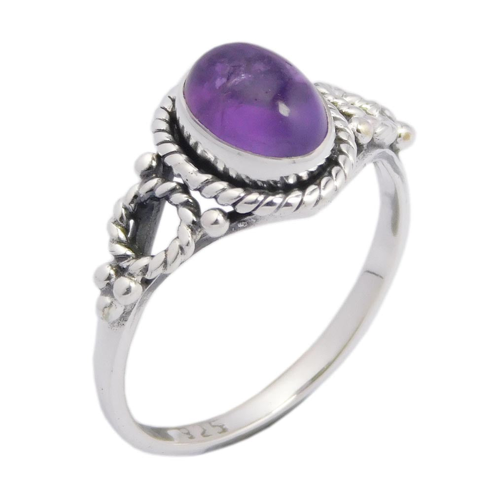 Ring Amethyst Oval Raised Cabochon Stone With Rope Style Border And Bobble Design At The Sides. Approx Weight Is 9 Grams 925 Sterling Silver