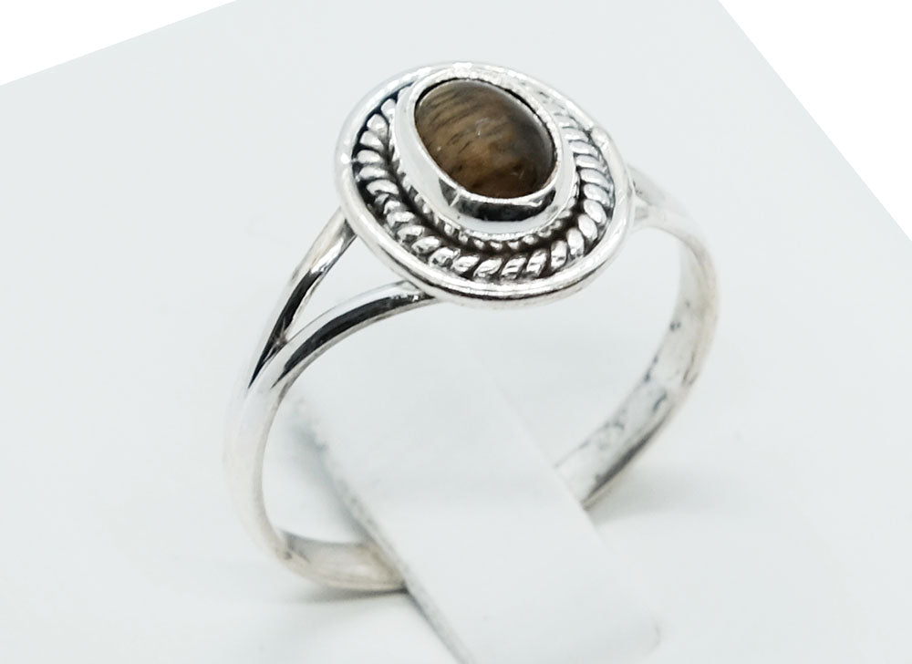 Ring Tiger Eye Oval Raised Cabochon Stone With Rope Style Border. Approx Weight Is 7 Grams 925 Sterling Silver