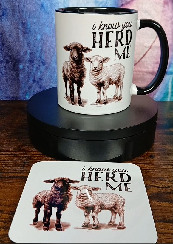 A cute "I know you herd me" Mug and Coaster set featuring a couple of lambs - Drinkware