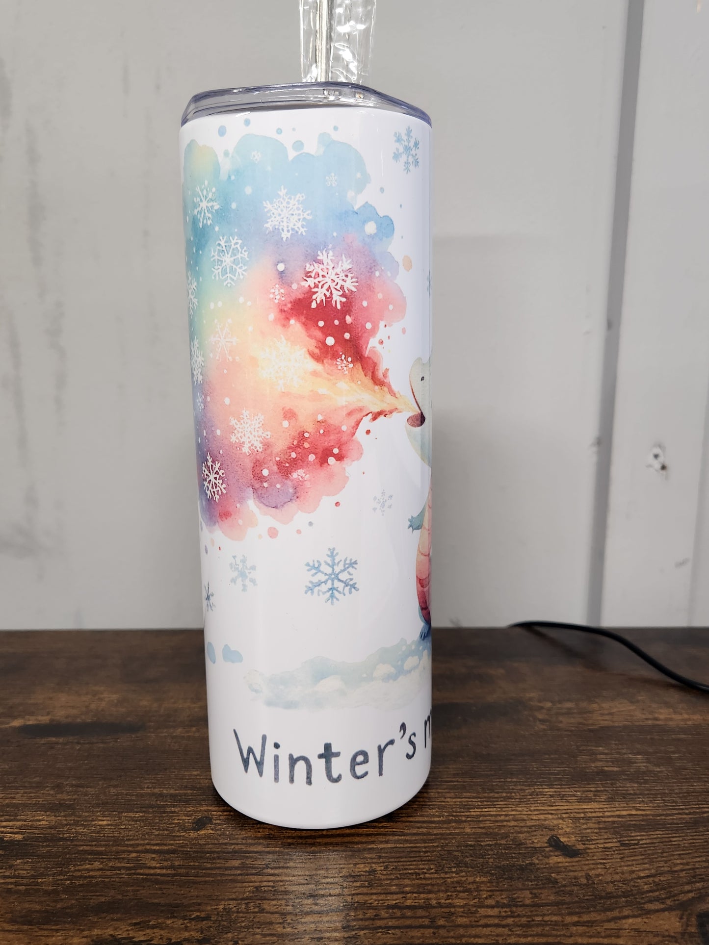 A Cute, Little Ice Dragon with "Winter's Magic" message - Tumbler