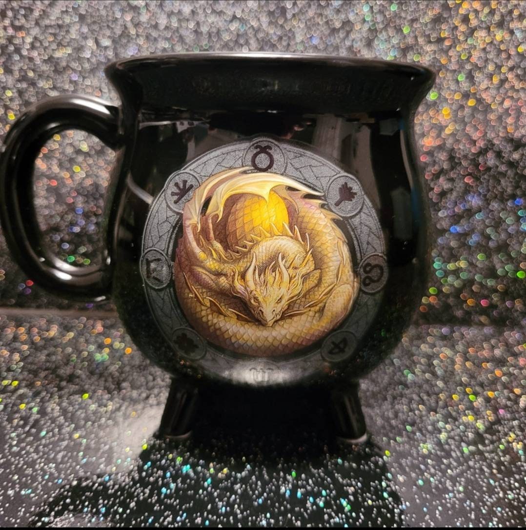 Ostara colour changing cauldron mug by Anne Stokes