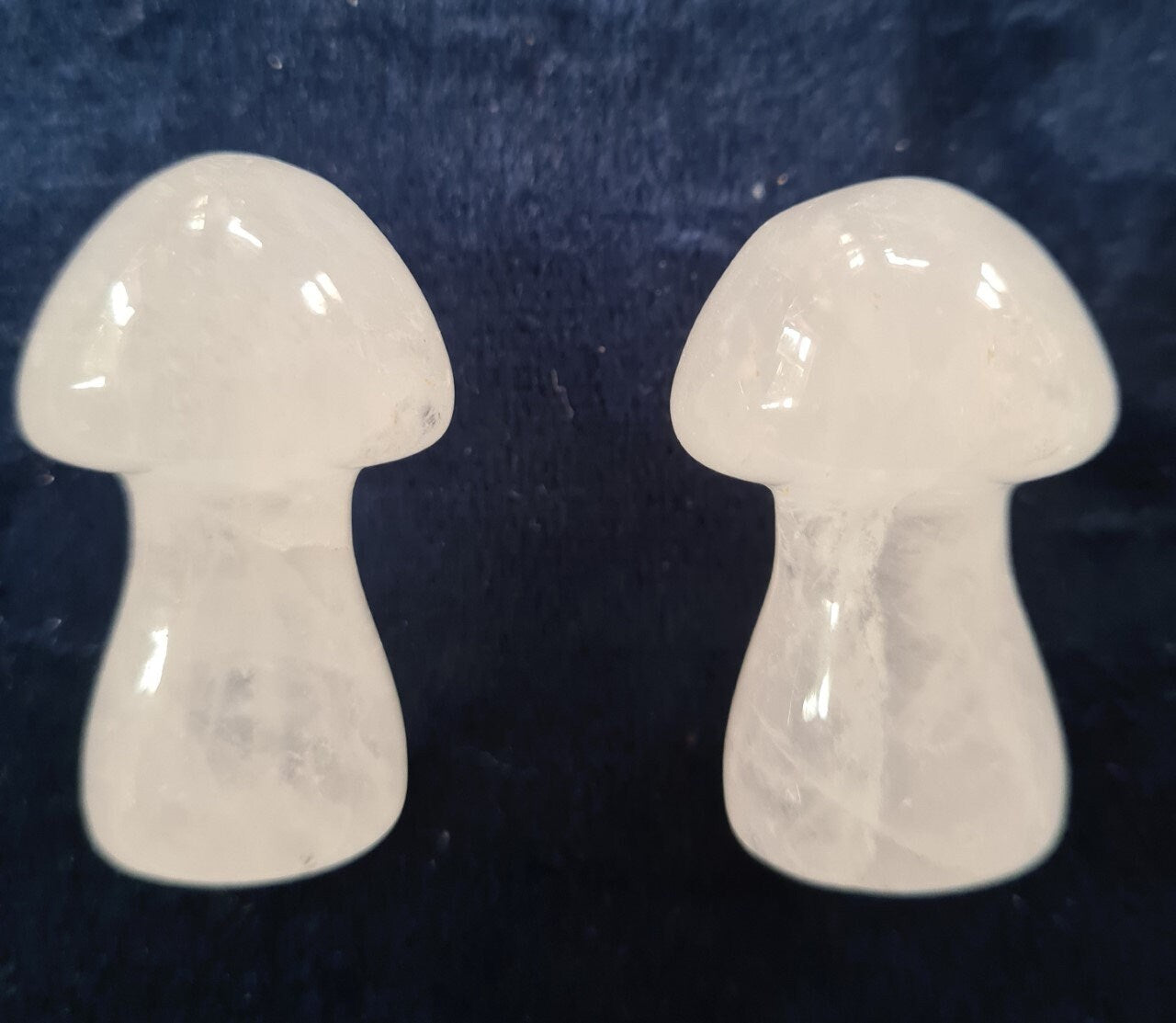 Lovely clear quartz mushroom carvings